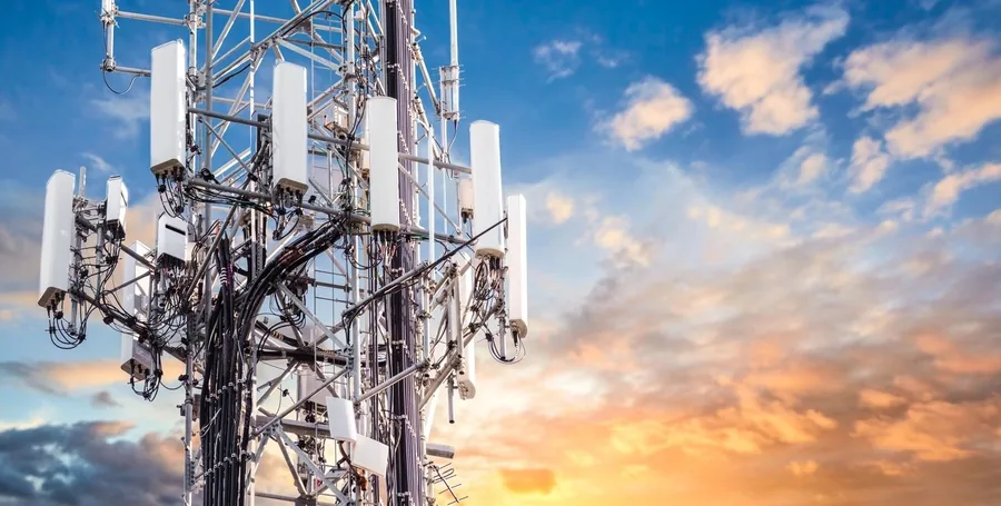 Telecommunications tower against an open sky